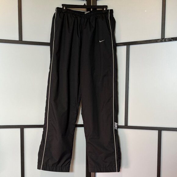Nike Windrunner Women's High-Waisted Zipper Open-Hem Pants - Picture 1 of 13
